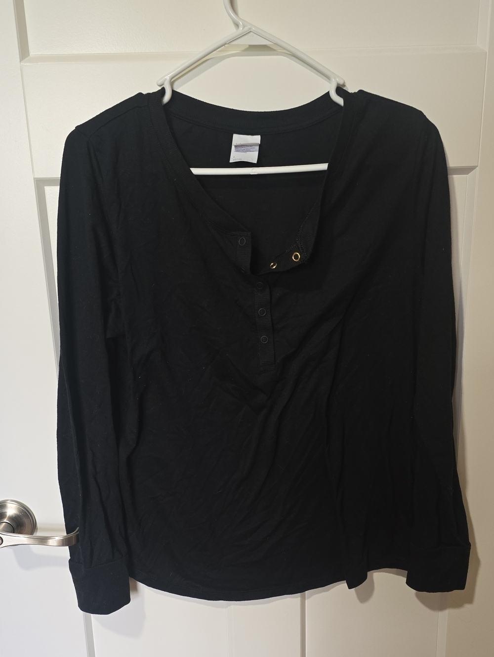 stars above Black Long-Sleeve Henley Top with Grommet Detail